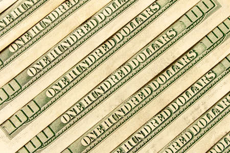 Abstract background of hundred-dollar bills. Selective focusの写真素材