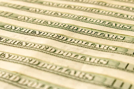 Abstract background of hundred-dollar bills. Selective focusの写真素材