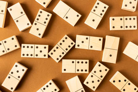 A game of dominoes on a brown background. Close-up. Selective focusの写真素材