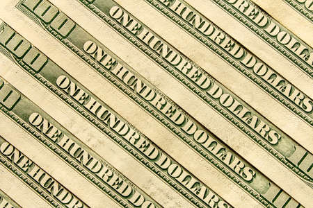 Abstract background of hundred-dollar bills. Selective focusの写真素材