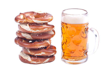 Bavarian pretzels with beer over white background