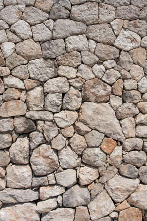 Stone wall constructed of fragments of rockの写真素材