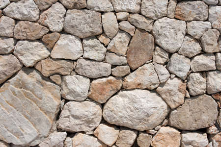 Stone wall constructed of fragments of rockの写真素材