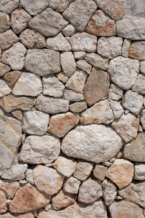 Stone wall constructed of fragments of rockの写真素材