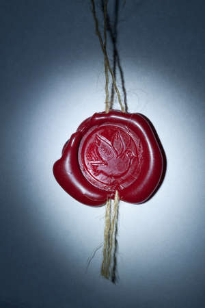 Vintage wax seal with Pigeon In The Ray of Lightの写真素材