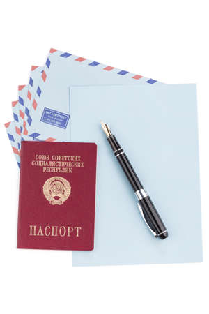 vintage air mail envelopes with a letter and fountain pen over whiteの写真素材