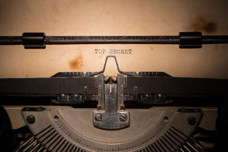 Top Secret message printed on old typing machineの写真素材