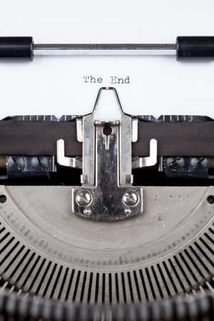 The End message printed on old typing machineの写真素材