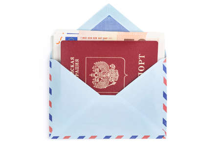 Airmail envelope with a money and russian travel passportの写真素材