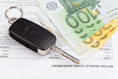 Lease motor vehicle Document Agreement with car keyの写真素材