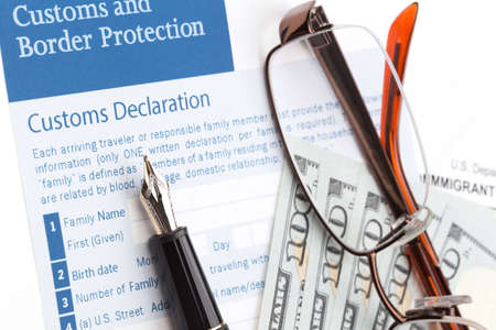 visa application with customs declaration and fountain penの写真素材