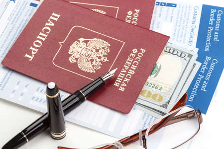 customs declaration russian travel passport and fountain penの写真素材