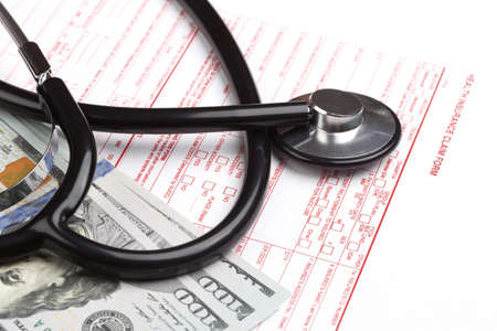 health insurance claim form with stethoskop