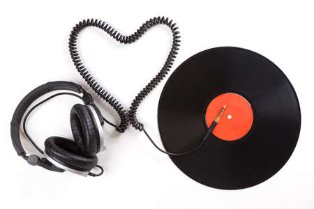 headphone cord from a heart shape over whiteの写真素材