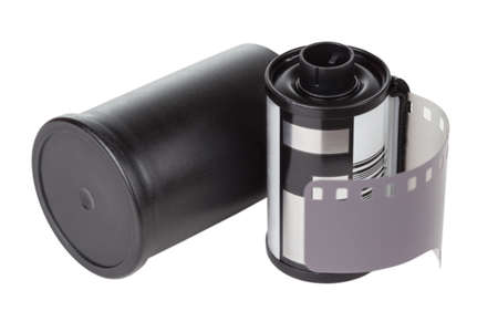 film cartridge with can over white background