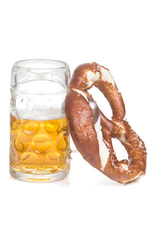 pretzel and beer mug over white backgroundの写真素材