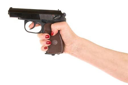 female hand holding gun over white
