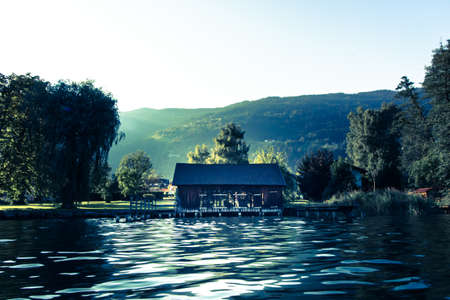 lake at sunrise in the mountainsの写真素材