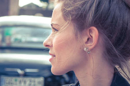 young woman and vintage carの写真素材