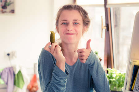pregnant woman likes eating pickles