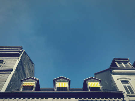 blue sky and yellow awnings in germanyの写真素材