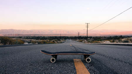 skating empty road in the mountainsの写真素材