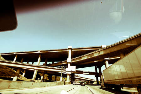 connecting bridges and truck on highwayの写真素材