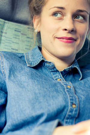 young woman happy to take the trainの写真素材