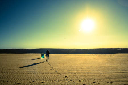 human traces on an empty beachの写真素材