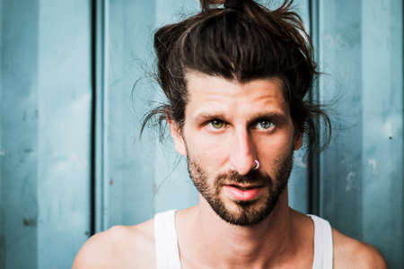 Portrait of a handsome young hipster manの写真素材