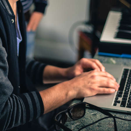 recording music on the computer at homeの写真素材