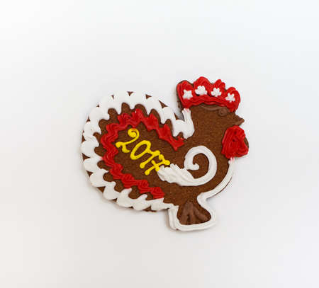 Gingerbread "Cock" on a white backgroundの写真素材