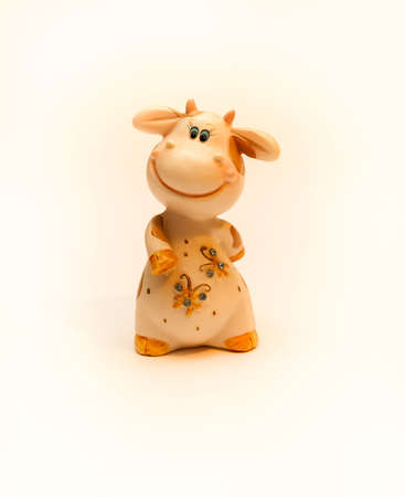 Souvenir "the Smiling cow" ceramic on white backgroundの写真素材