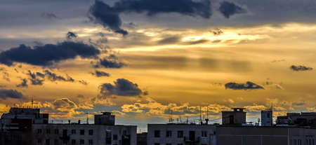 Sunset over cityの写真素材