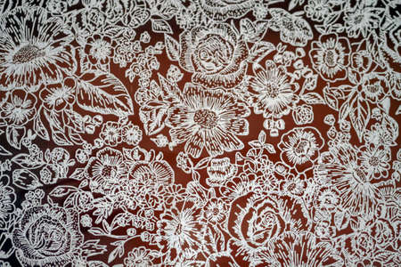 The white tablecloth against a dark background