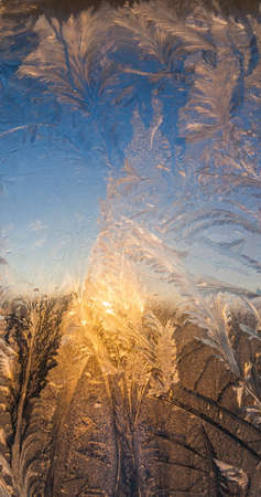 the frosty patterns on the windowの写真素材