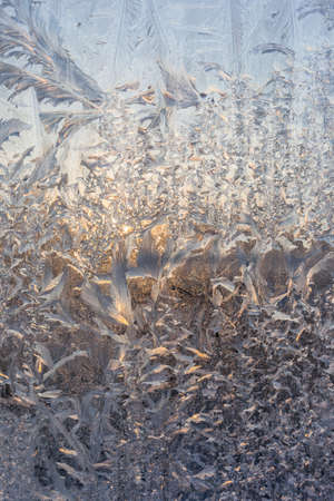 the frosty patterns on the windowの写真素材