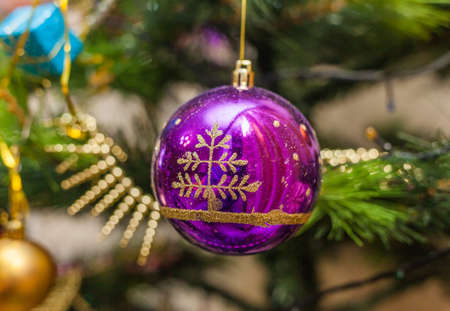 Christmas artificial tree decorated with toysの写真素材