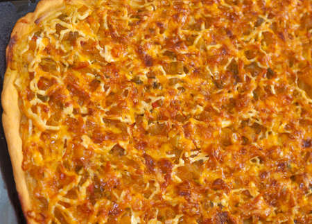 Ready homemade vegetarian pizza closeup on the baking sheetの写真素材
