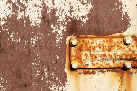 Rusty Paint Wall Texture. Scratches and Cracks. Clamp with Bolts.の写真素材