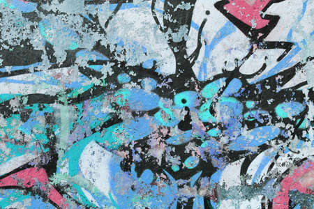 Old Weathered Graffiti Wall. Colorful Concrete Wall Fragment. Blue Turquoise Black.