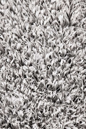 White artificial grass texture background. Modern monochrome backdrop. Exterior interior.