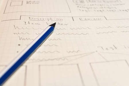 Online shop single page prototyping sketch with blue pencil. Website planning concept.の写真素材