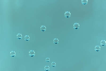 Blue bubbles macro closeup background texture.