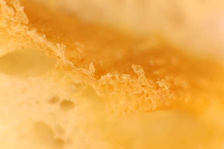 Pulp of bread macro closeup. Texture background. Slice section. Corner.の写真素材