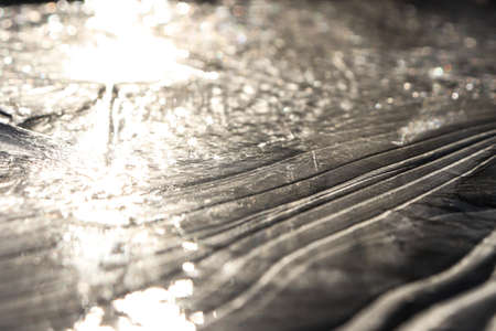 Ice Lake Lines Pattern Surface Background Texture. Wavy Drawings of Ice Lines on a Frozen Lake.の写真素材