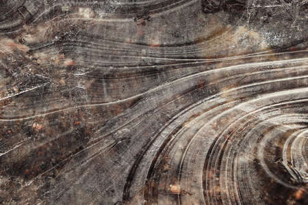 Ice Surface Background Texture. Wavy Drawings of Ice Lines on a Frozen Lake.の写真素材