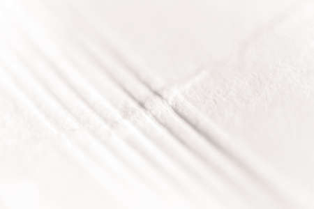 Soft Folds on Detailed Macro Paper Texture Background.