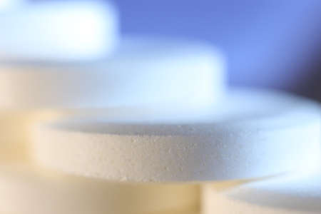 Big White Medicine Tablets Stairs. Pharmacy Pills Background. Macro Closeup.の写真素材