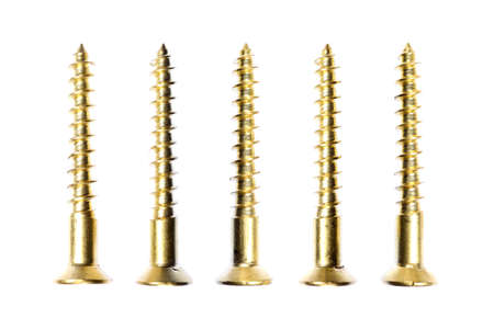 Golden Screws Texture. Construction Tool Equipment Background.の写真素材